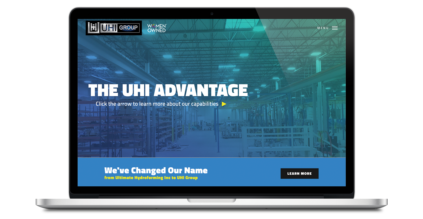 UHI website home page on laptop