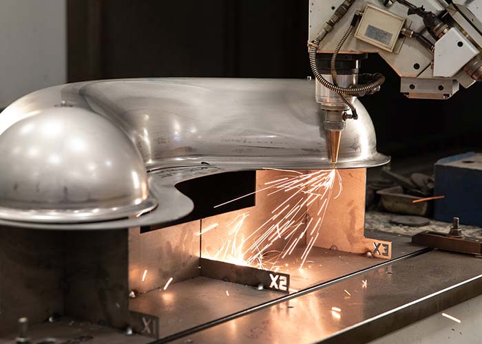 welding a part at UHI